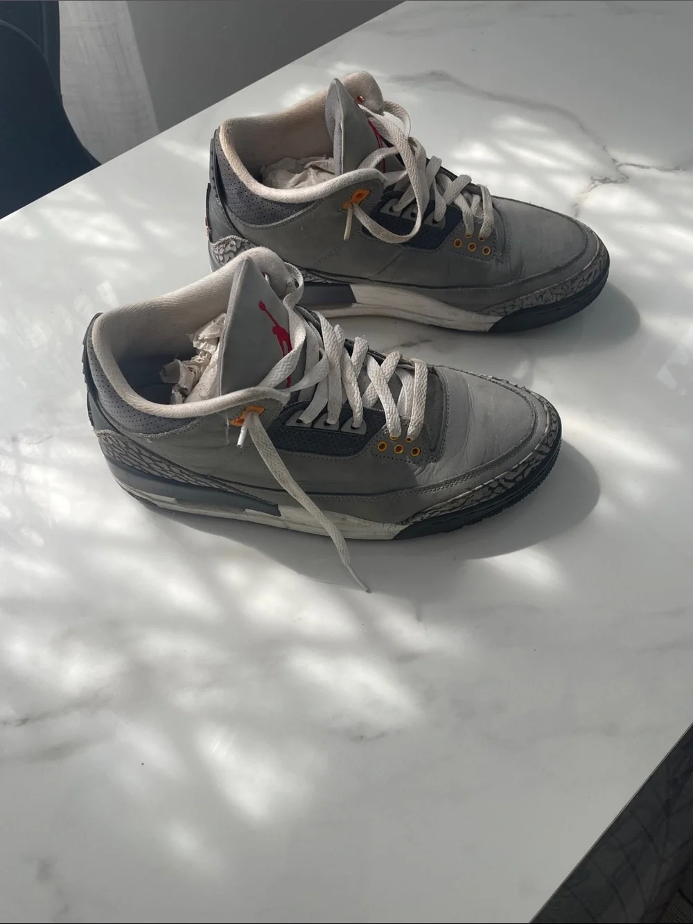 Jordan Gray and Black Retro Sneakers with Red Tongue Logo